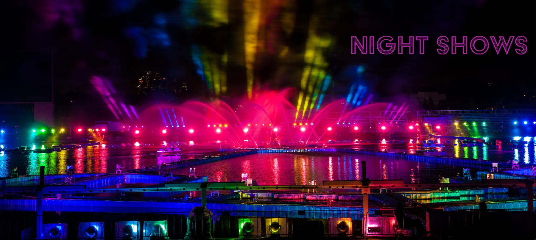 Large night show with lighting and pyrotechnic effects